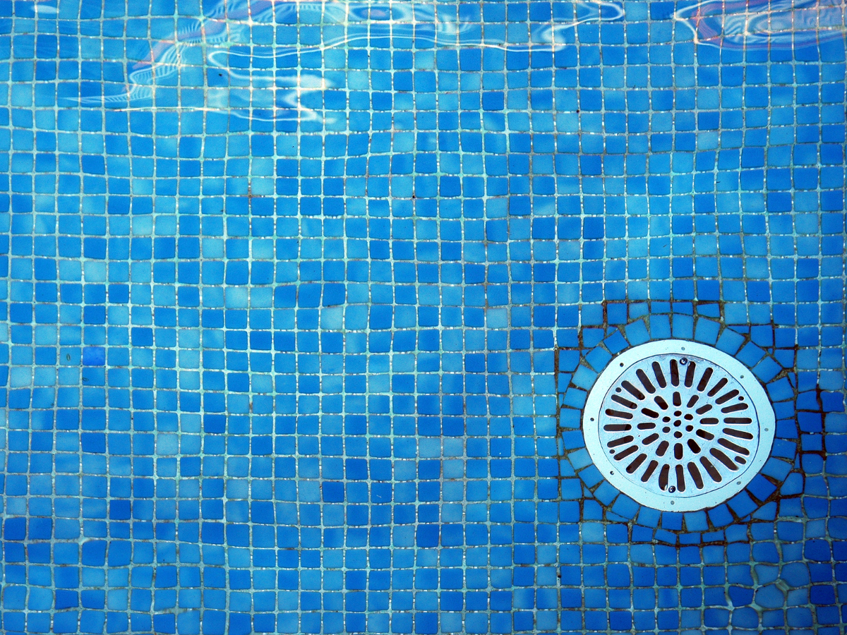 A pool floor shows how Titan Plumbing & Drains uses quality parts for safe water flow and reliable plumbing.