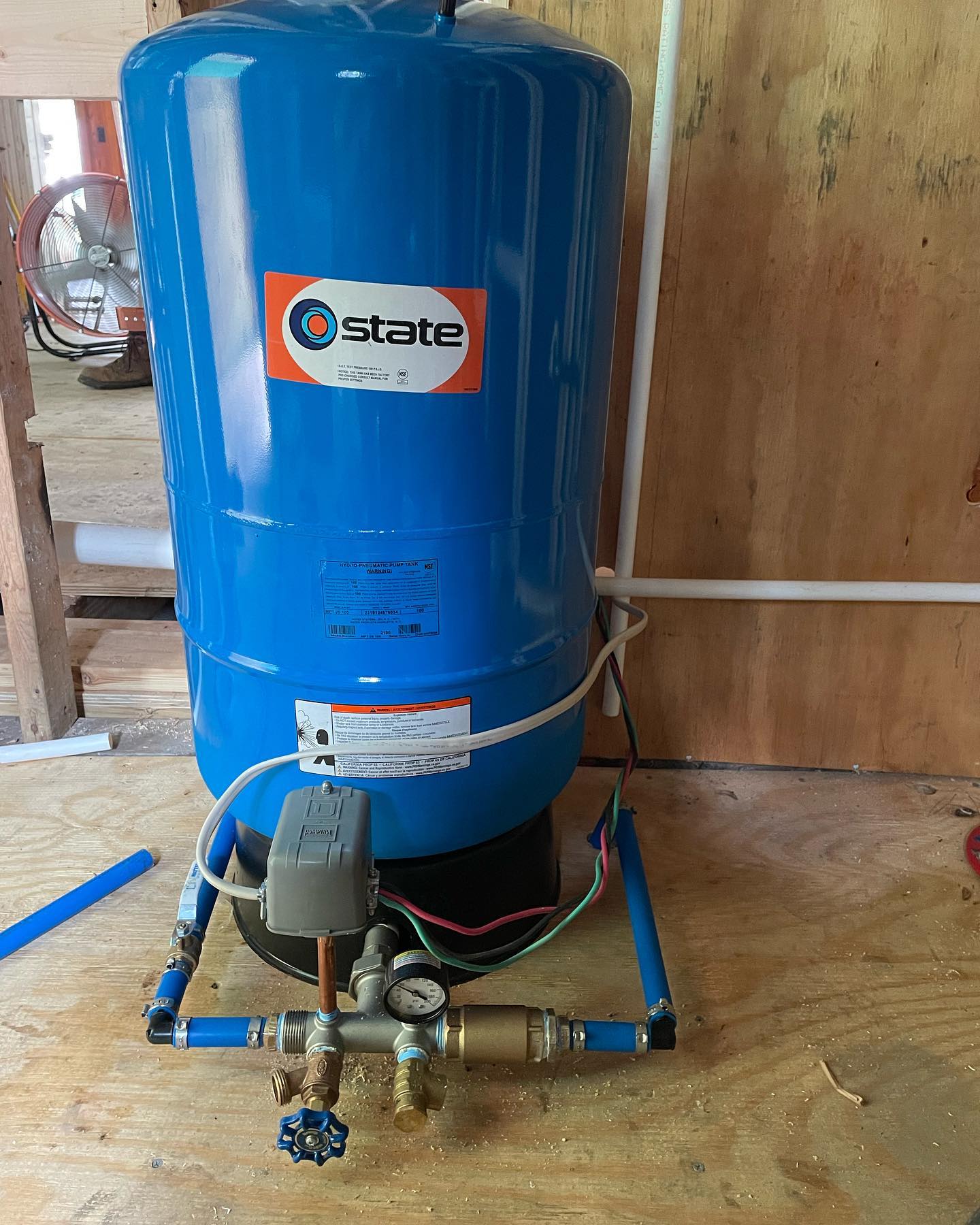 A pressure tank setup by Titan Plumbing & Drains shows a safe and reliable water system for homes or businesses.